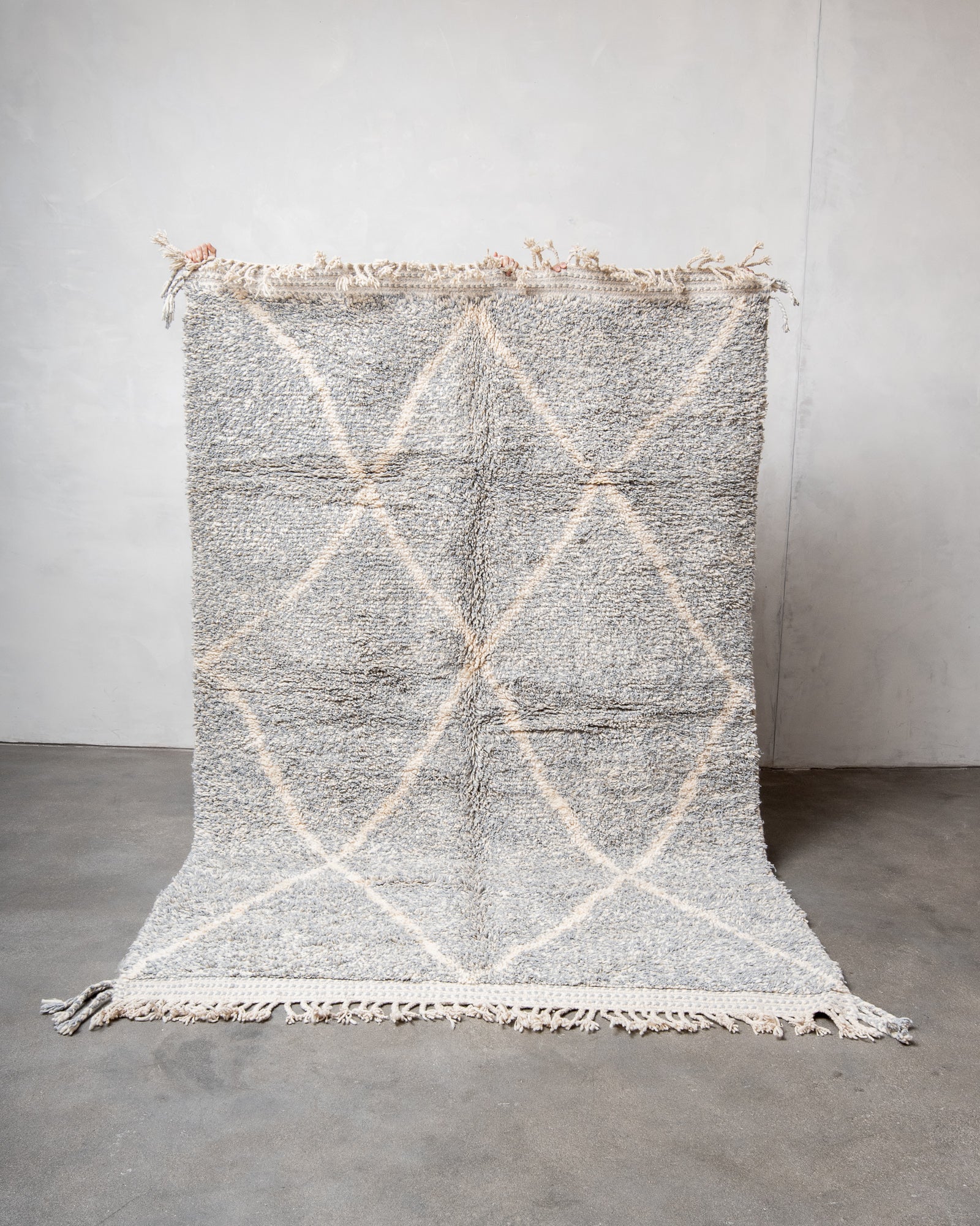 Modern, designer, handcrafted Berber rug from Morocco. Beniourain carpet with beautiful colours and patterns and fluffy wool texture.